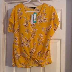 NET. Yellow floral blouse